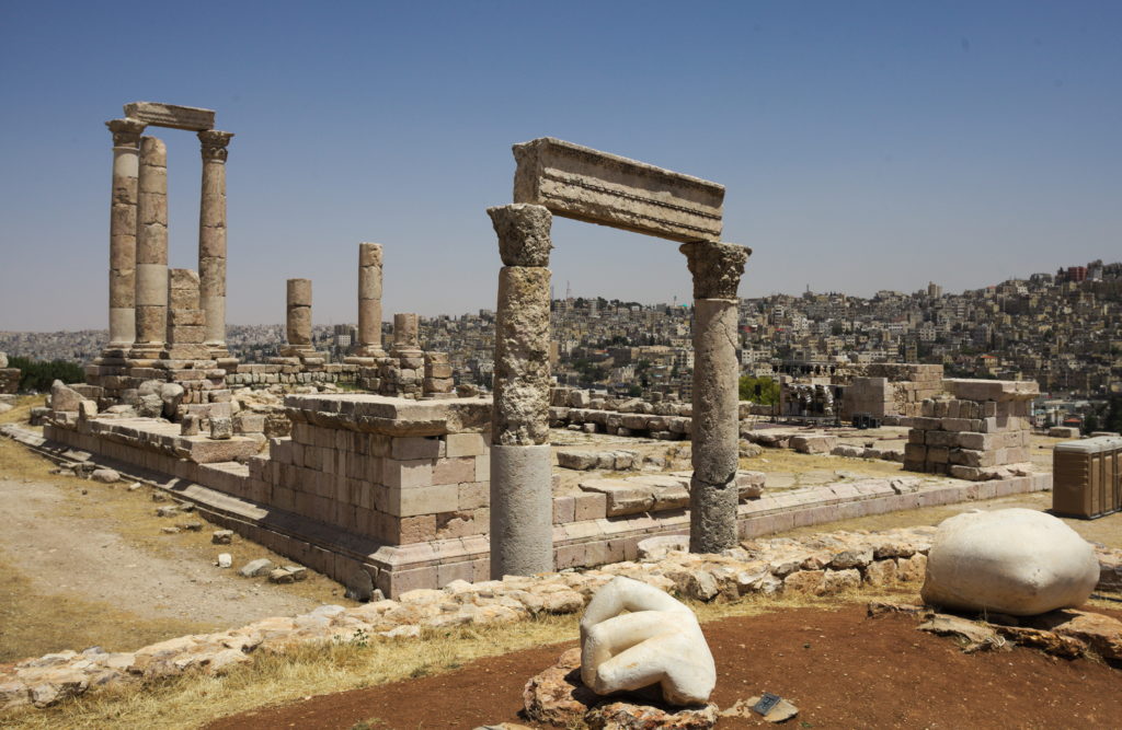 View over Amman from the citadel located on a high peak in the midst of the city. The hand and elbow used to be part of a gigantic Roman statue.